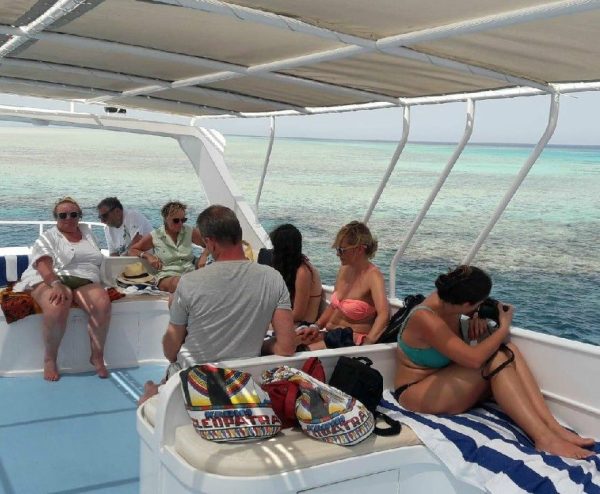 Relaxing on the upper deck of the fishing boat off Marsa Alam, the Red Sea 