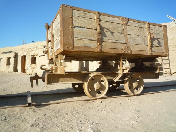 You can see the wagons that, for much of the 20th century, miners had to push while loaded with phosphate. Photo copyright Alisdare Hickson 2009
