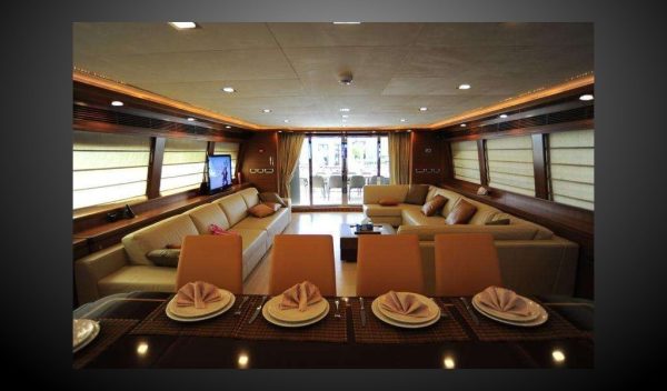 The yacht's spacious relaxation area and dining room