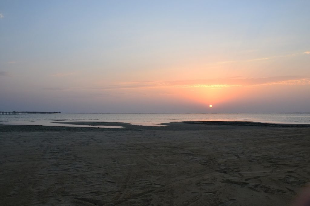Sunrise on the beach - jetty visible to the left. 2012. 
Gaggi Luca 76  - CC BY 3.0 - via Wikimedia