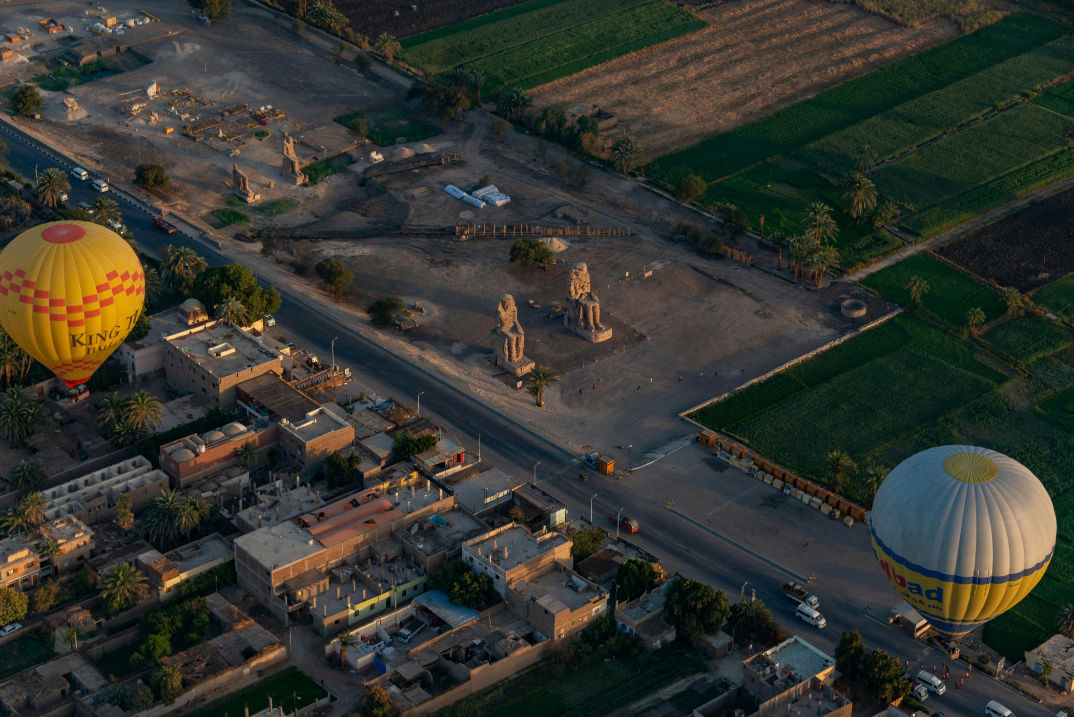 An aerial perspective of the Colossi of Memnon Photo credit: Diego F Parra at Pexels.com