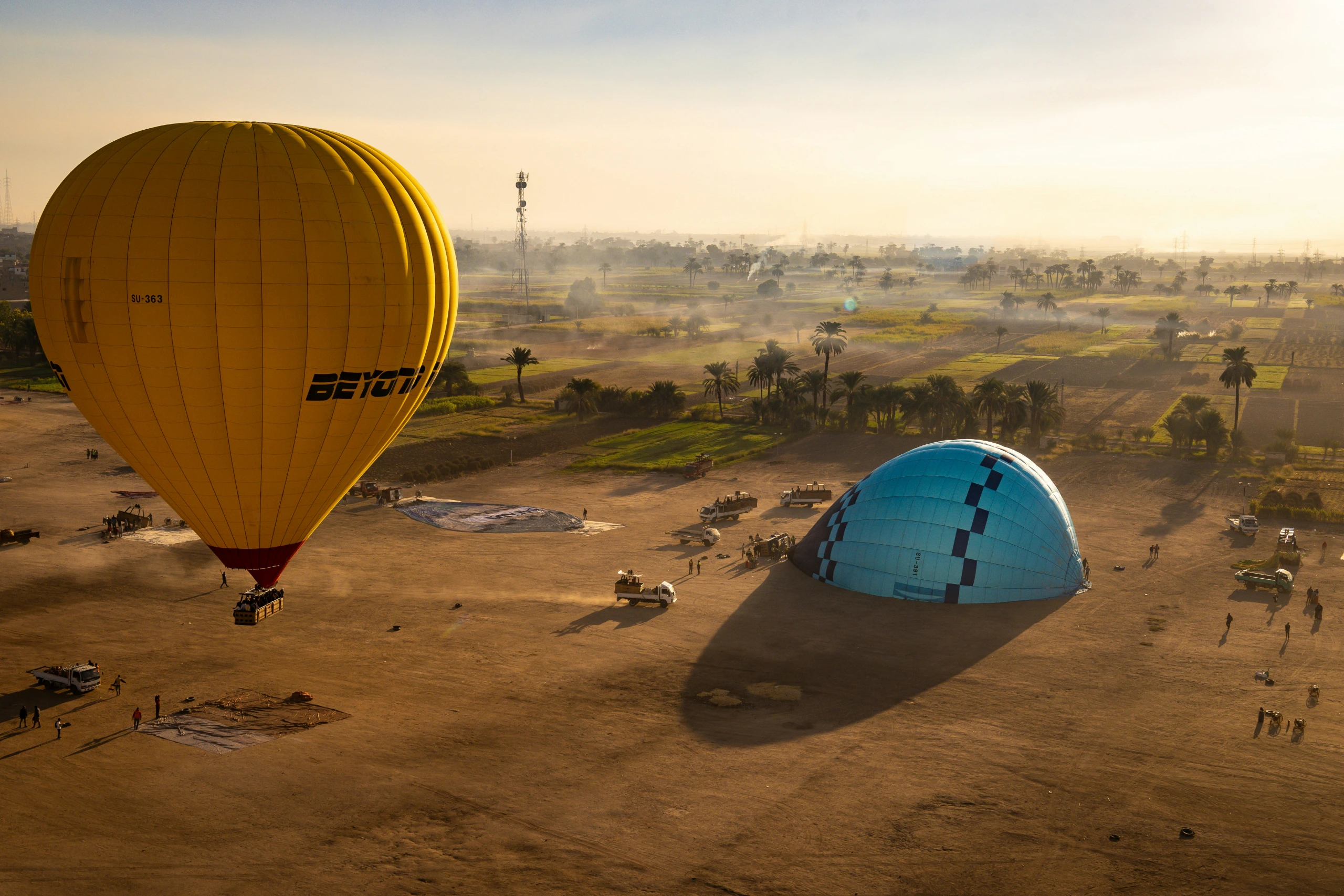 A busy scene at Luxor Ballooning Airport
Photo credit: Martijn Vonk via Unsplash.