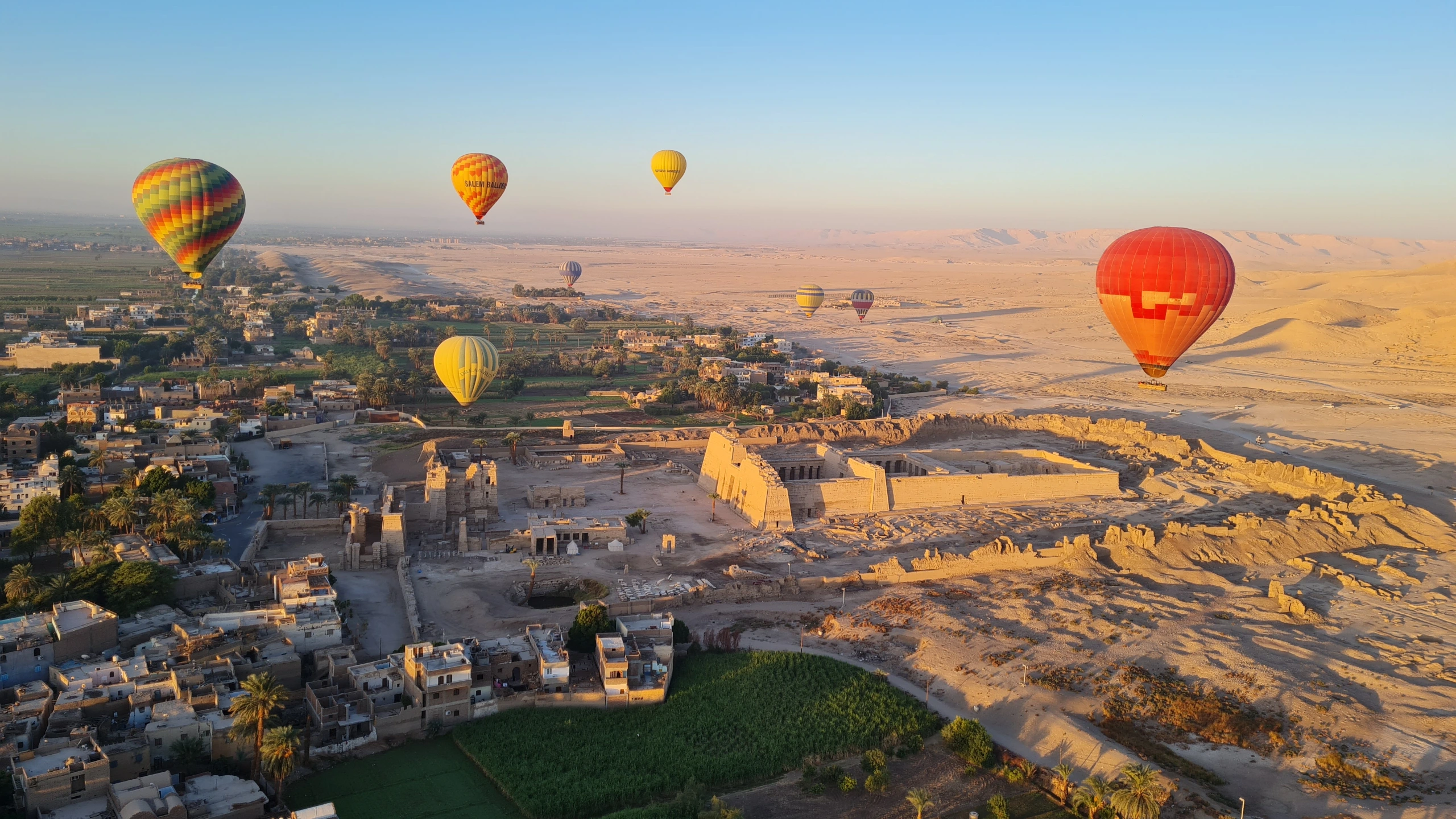 Hot air balloons drift over Habu Temple at sunrise.
Photo credit: Arun Katiyar CC BY-SA 2.0 via Flickr.com