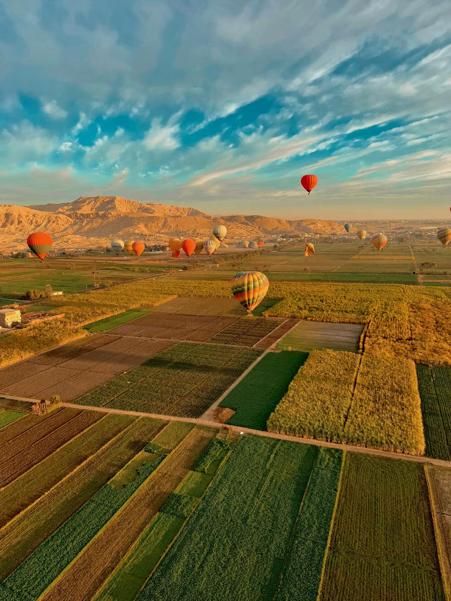 The early morning’s vibrant hues stretch across the fields, with Luxor Ballooning Airport just beyond.
Photo credit: GirlvsGlobe86 via Pexels.com