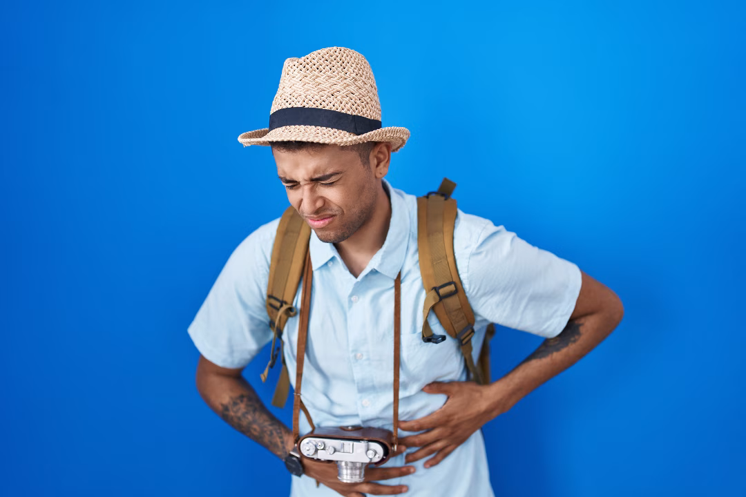 A man seems to have stomach ache. ID 253693416 © Aaron Amat | Dreamstime.com
