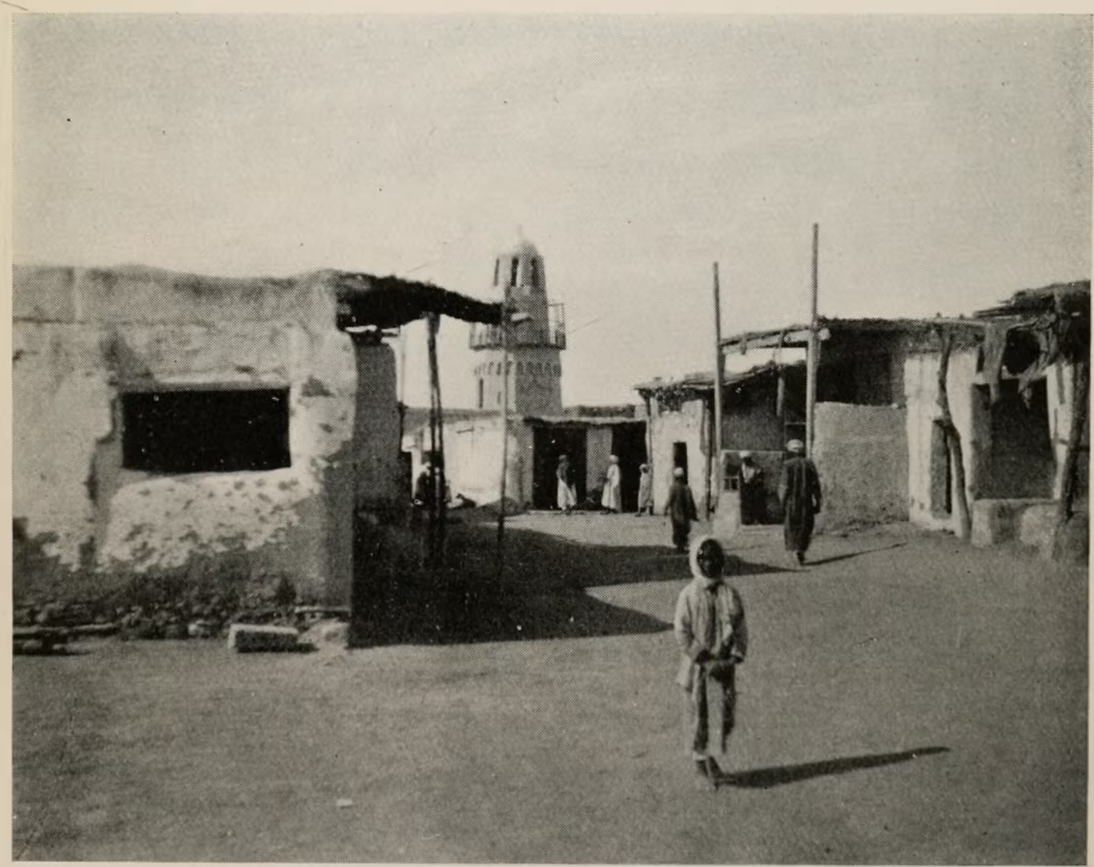 A 1913 photo showing the smaller minaret. 
From a book by A. Weigall via Wikimedia.